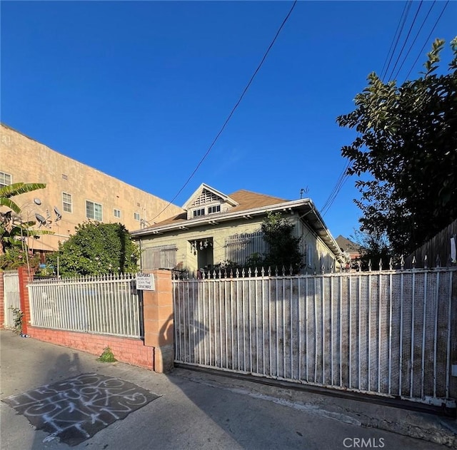 exterior space featuring a fenced front yard
