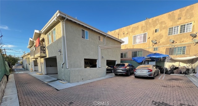 view of side of home with a garage