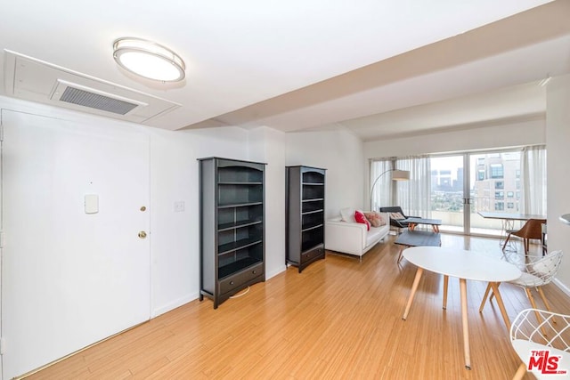 living room with wood-type flooring