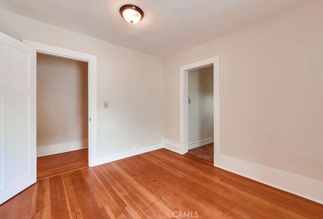 21457 Pecan St, Wildomar, CA 92595 - spare room with wood finished floors and baseboards