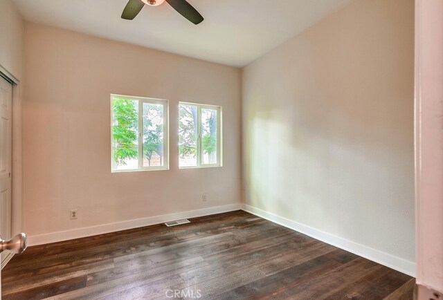 21457 Pecan St, Wildomar, CA 92595 - unfurnished bedroom with dark wood-type flooring and a ceiling fan