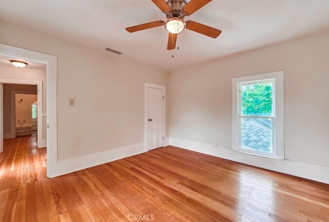 21457 Pecan St, Wildomar, CA 92595 - empty room featuring light wood-style flooring and ceiling fan