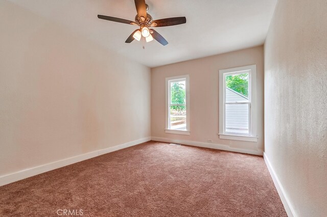 21457 Pecan St, Wildomar, CA 92595 - carpeted empty room featuring baseboards and ceiling fan