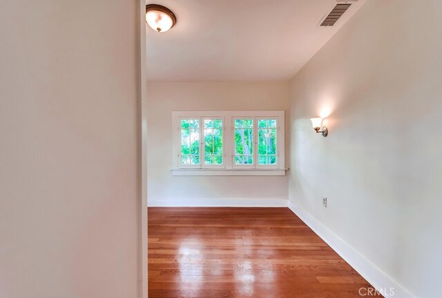 21457 Pecan St, Wildomar, CA 92595 - unfurnished room with hardwood / wood-style floors and baseboards
