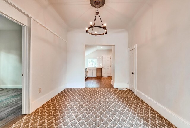 21457 Pecan St, Wildomar, CA 92595 - spare room featuring a chandelier and wood finished floors