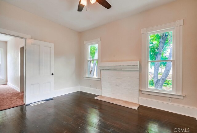 21457 Pecan St, Wildomar, CA 92595 - unfurnished living room with a ceiling fan and dark wood-style floors