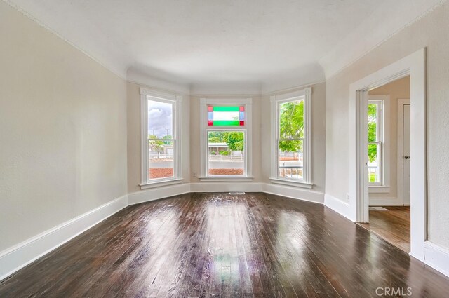21457 Pecan St, Wildomar, CA 92595 - empty room with wood finished floors and baseboards
