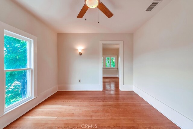 21457 Pecan St, Wildomar, CA 92595 - empty room with light wood finished floors and a ceiling fan