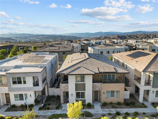 drone / aerial view featuring a mountain view