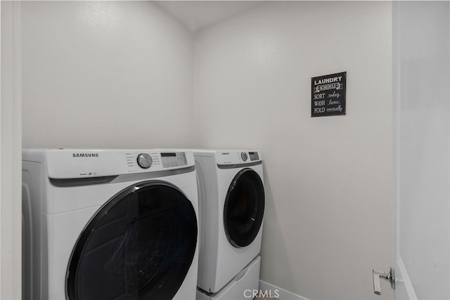 laundry room with washer and dryer