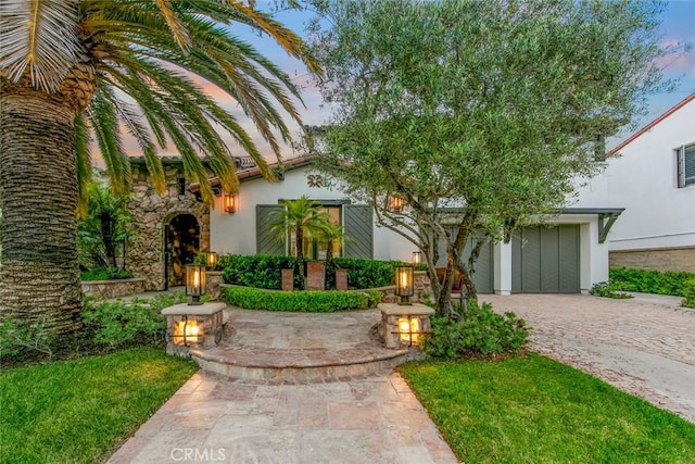 view of front of property featuring a garage