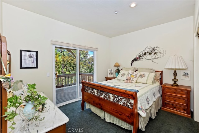 carpeted bedroom with access to exterior