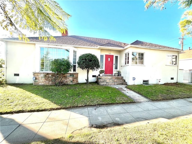 view of front of house with a front yard