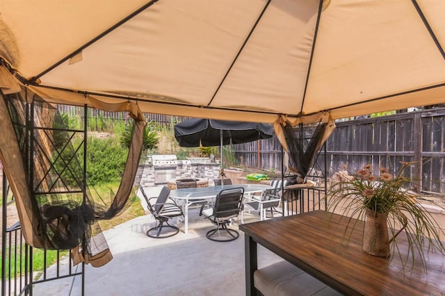 view of patio featuring a gazebo and grilling area