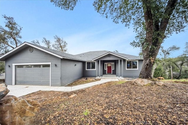 ranch-style home with a garage