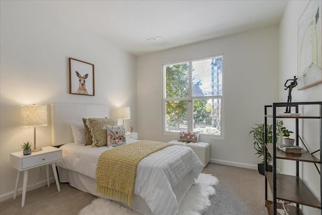 bedroom with light carpet