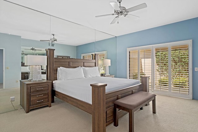 carpeted bedroom featuring ceiling fan and access to outside