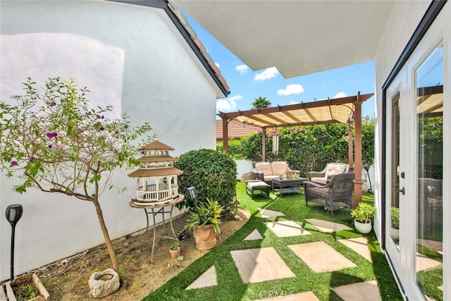 view of patio / terrace featuring a pergola and outdoor lounge area