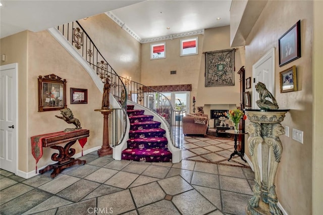 entrance foyer with a towering ceiling