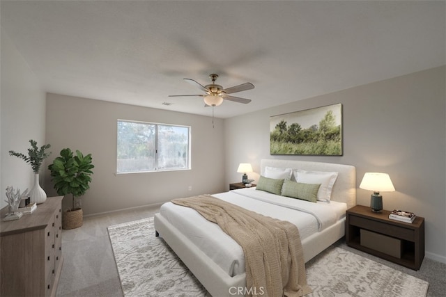 bedroom with light colored carpet and ceiling fan