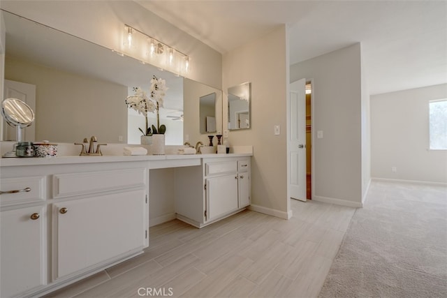 bathroom featuring dual bowl vanity