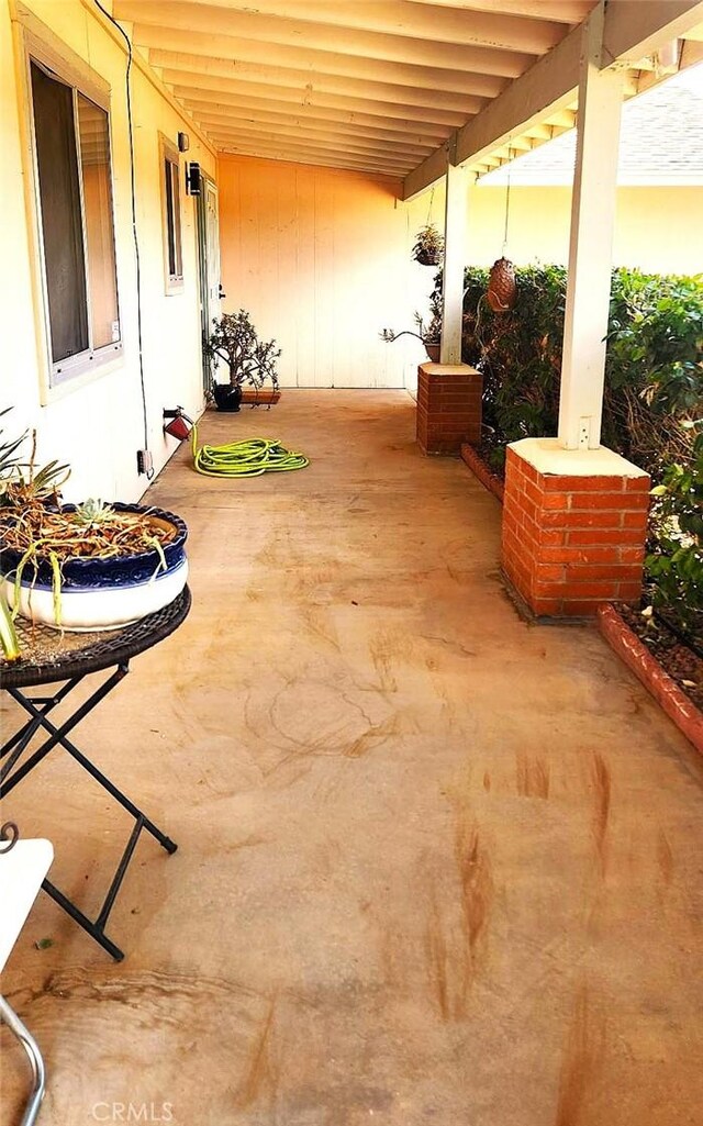 view of patio featuring a porch