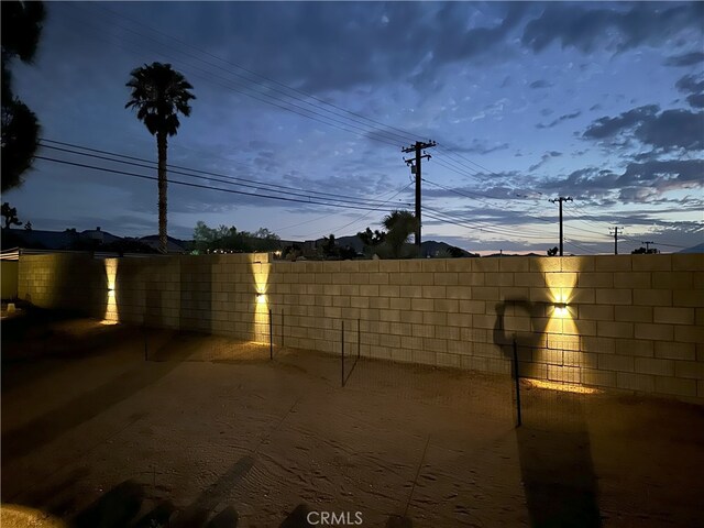 view of yard featuring fence