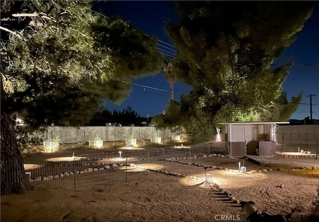 57825 El Dorado Dr, Yucca Valley, CA 92284 - view of yard at night