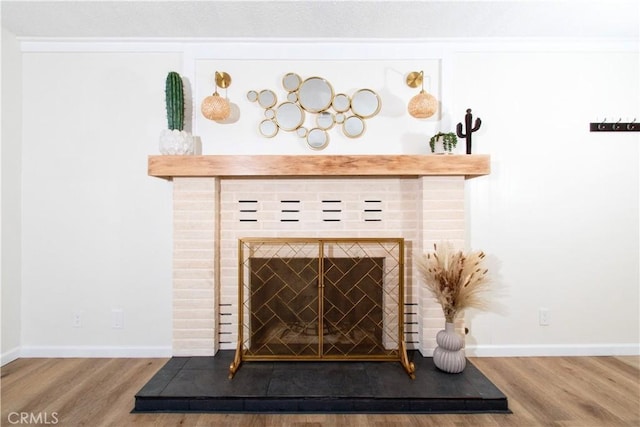 57825 El Dorado Dr, Yucca Valley, CA 92284 - detailed view of a brick fireplace and wood finished floors