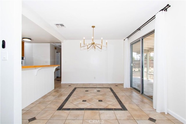 57825 El Dorado Dr, Yucca Valley, CA 92284 - unfurnished dining area featuring a chandelier and light tile patterned flooring