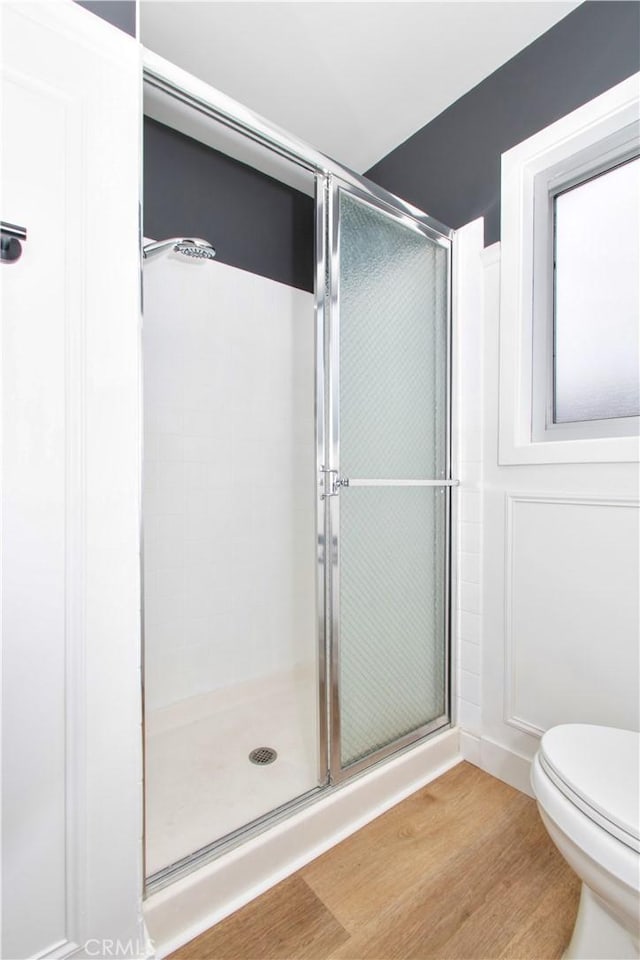57825 El Dorado Dr, Yucca Valley, CA 92284 - bathroom featuring a stall shower and wood finished floors