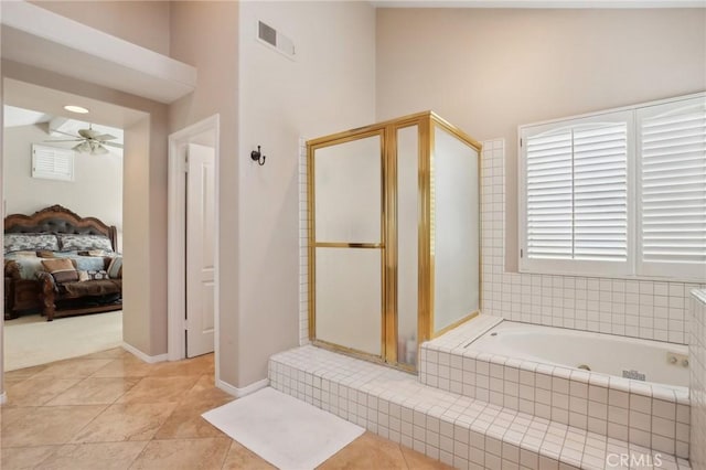 bathroom featuring tile patterned floors, ceiling fan, vaulted ceiling, and shower with separate bathtub