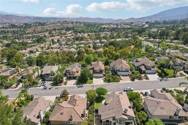 drone / aerial view featuring a mountain view