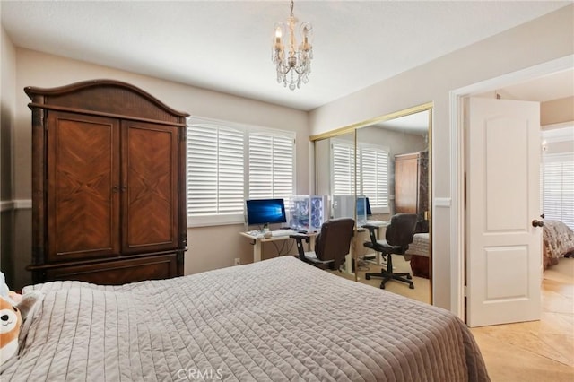 tiled bedroom featuring a closet, multiple windows, and a notable chandelier