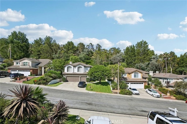 exterior space with a garage and central AC unit