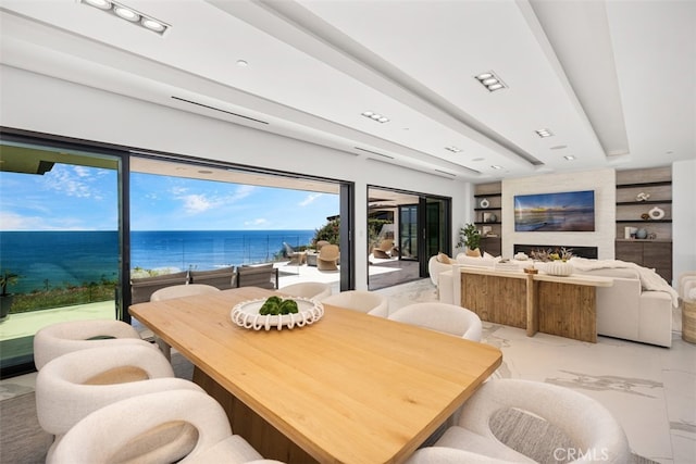 dining room featuring beamed ceiling