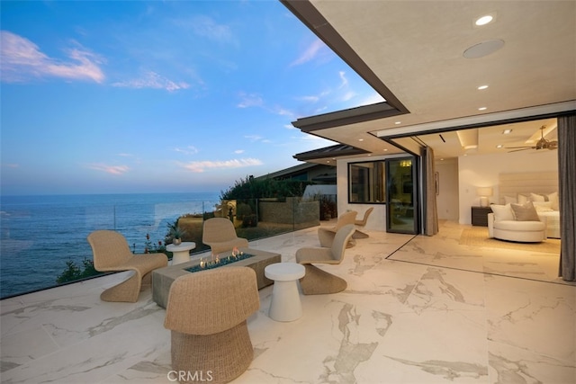 view of patio / terrace featuring a water view