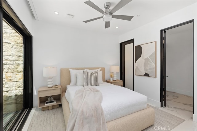 bedroom featuring ceiling fan