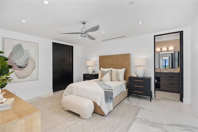 bedroom with ceiling fan and ensuite bath