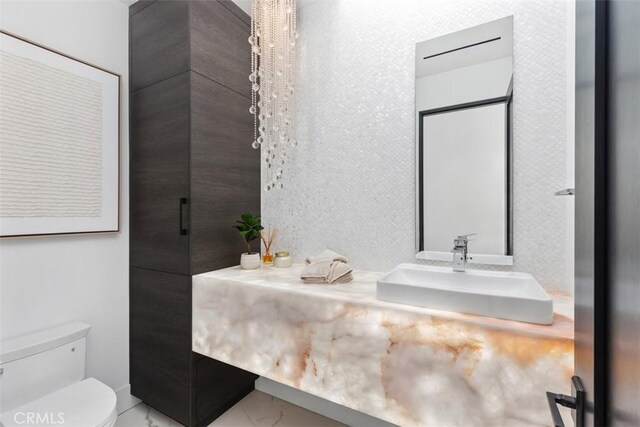 67 Monarch Bay Dr, Dana Point, CA 92629 - bathroom featuring marble finish floor, toilet, and vanity