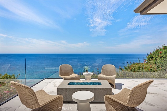 view of patio / terrace featuring a water view