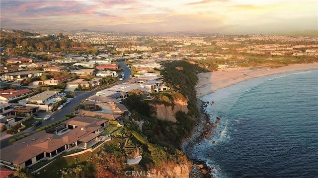 67 Monarch Bay Dr, Dana Point, CA 92629 - aerial view at dusk featuring a beach view and a water view