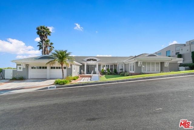 single story home featuring a garage