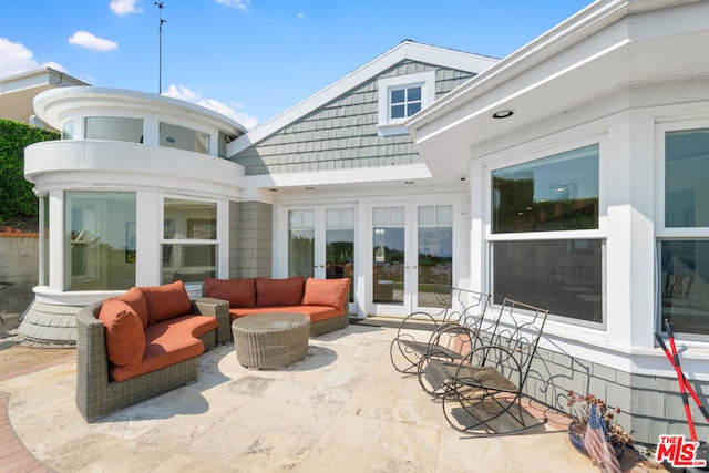 view of patio featuring french doors and outdoor lounge area