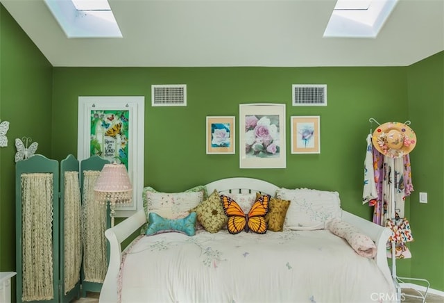 bedroom featuring a skylight