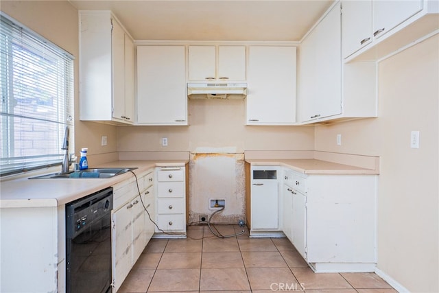 kitchen with sink, white cabinets, dishwasher, and light tile patterned flooring