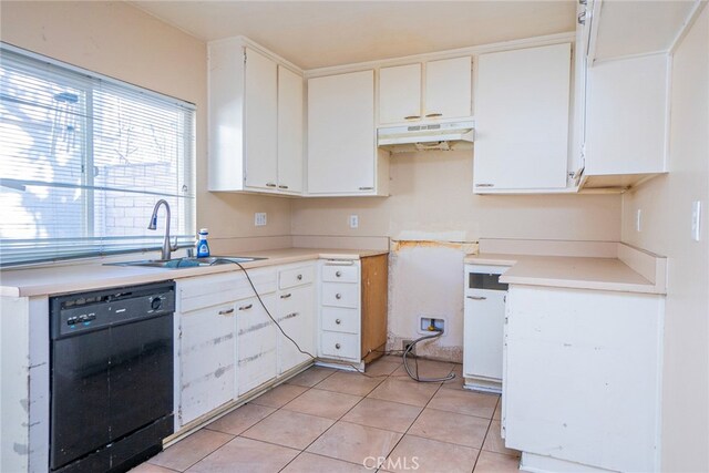 kitchen with sink, dishwasher, white cabinetry, and light tile patterned floors