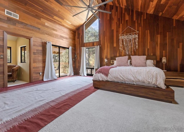 bedroom featuring carpet, a chandelier, high vaulted ceiling, wooden ceiling, and wood walls