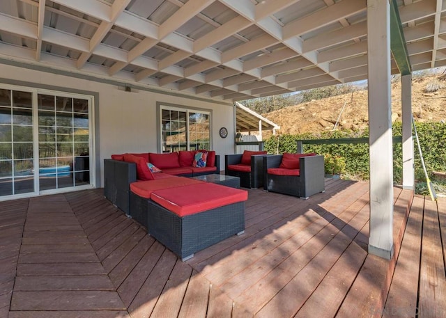 deck with an outdoor hangout area