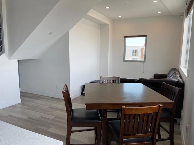 dining space featuring light hardwood / wood-style flooring